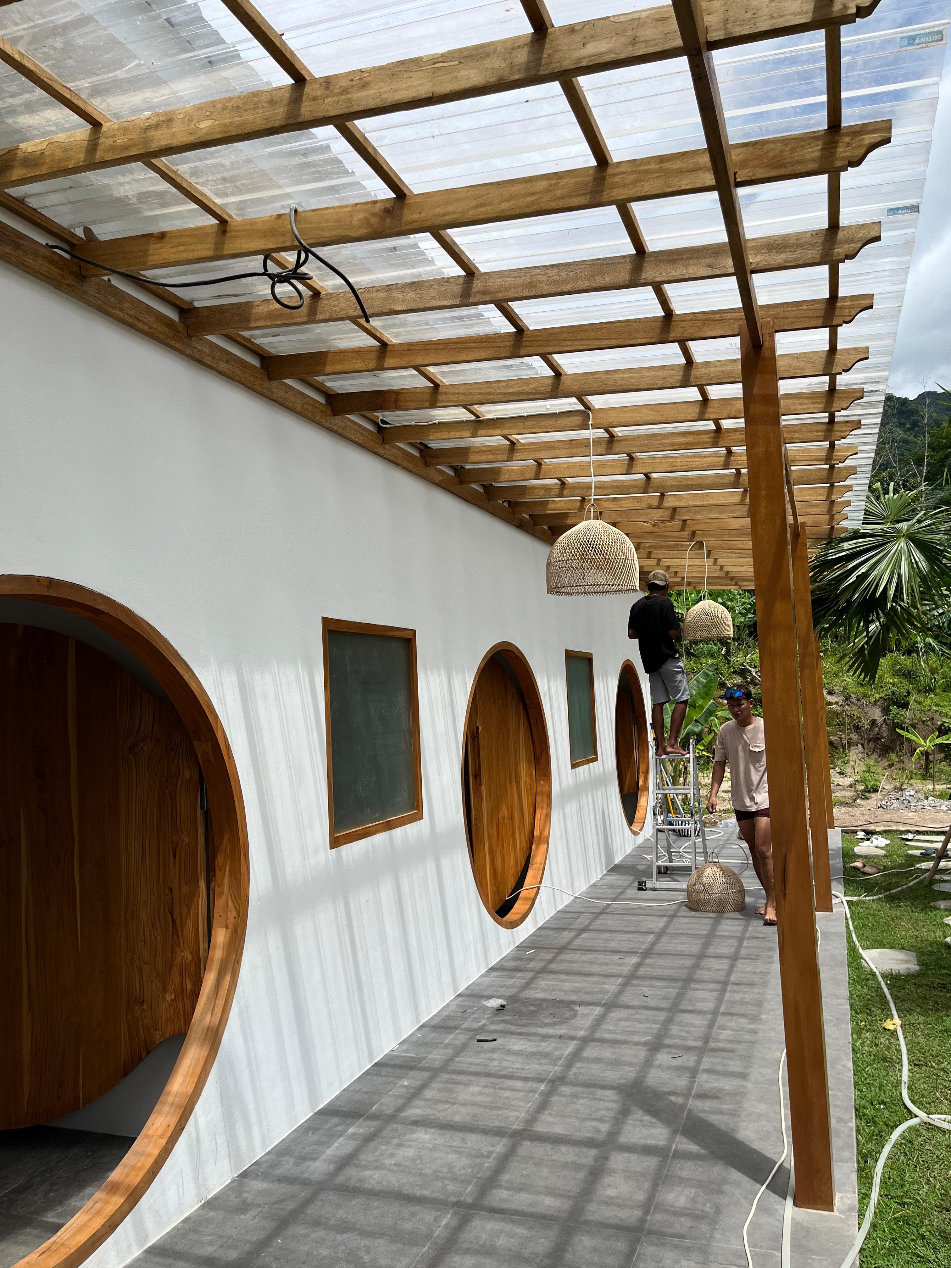 Circular wooden doors at the entrance