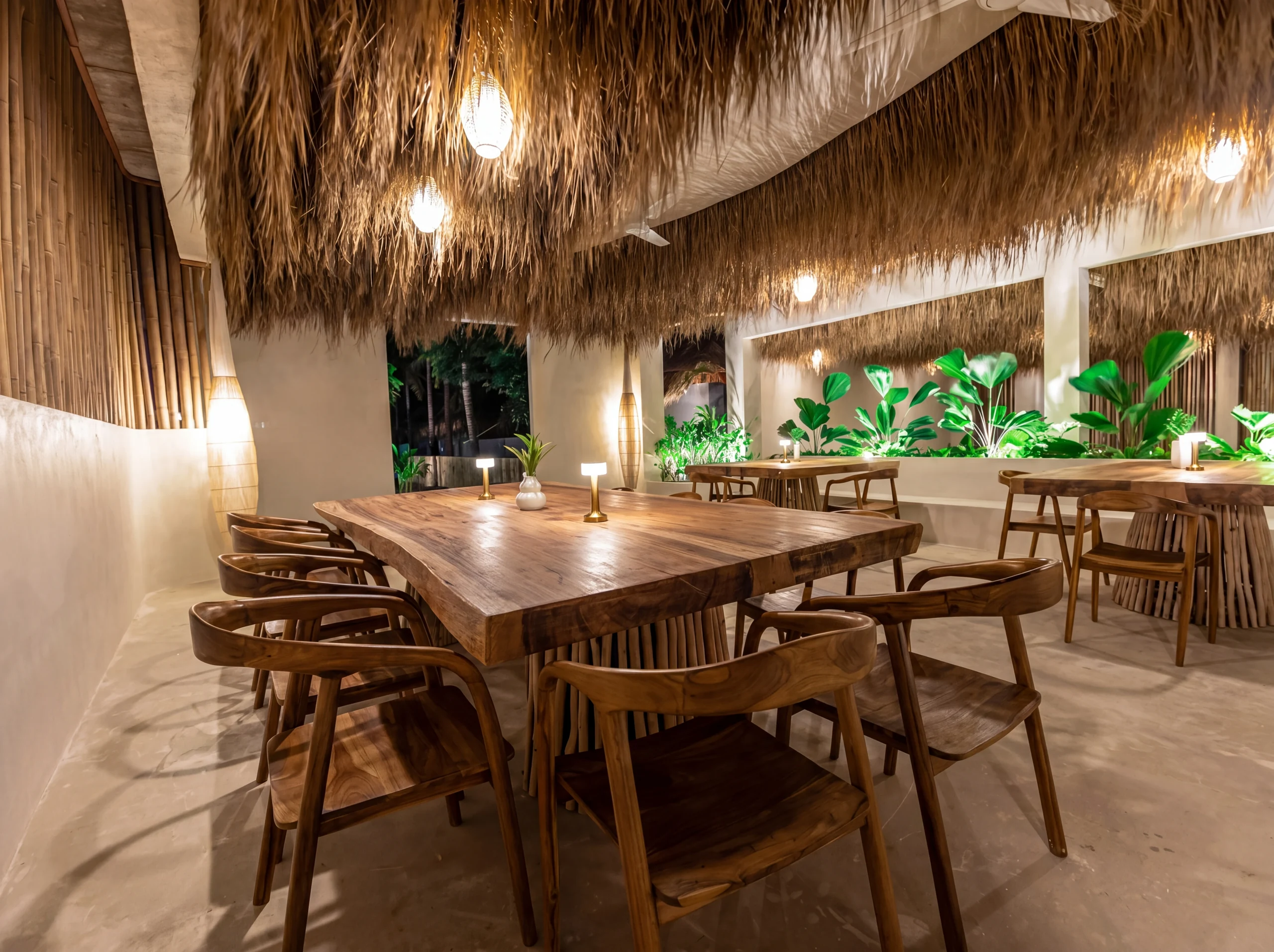 Restaurant dining area with thatched roof ceiling