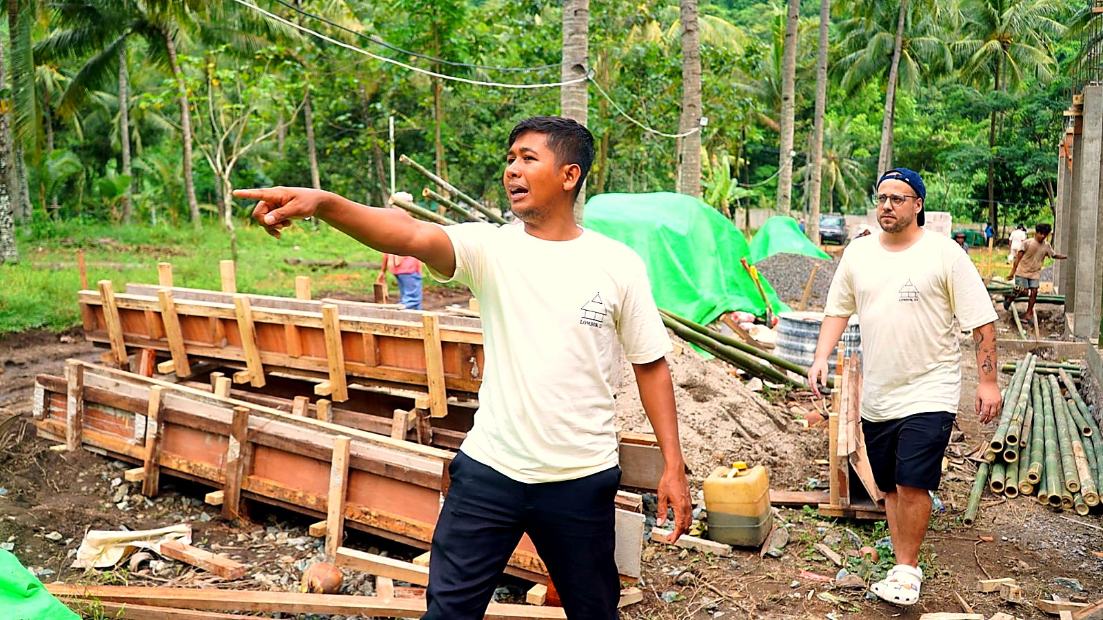 Foreman giving instructions on site while Ramon Revuelta walks behind